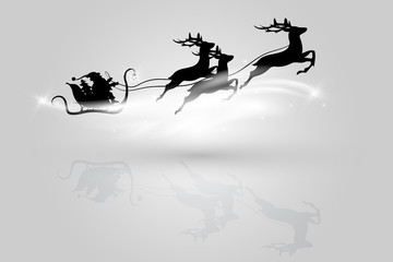 Santa Claus flying in a sleigh with reindeer.