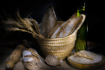 Fresh wholemeal bread with flour and wheat ears