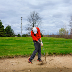 Golf Swing in the Sand