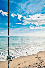 Fishing rod nailed to the seashore