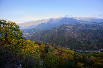 Fototapeta na wymiar Majestic autumn landscape with mountains and forest, Armenia
