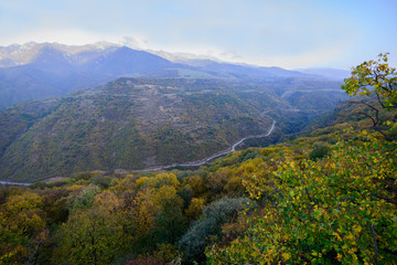 Naklejka na ściany i meble Majestic autumn landscape with mountains and forest, Armenia