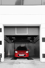 Red auto at car wash. Cleaning service