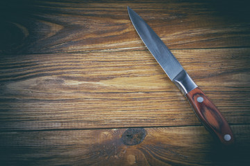 knife on a wooden table