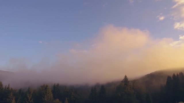 Aerial Drone Footage Panning Across Valley Fog in the Romanian Mountains.