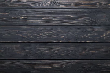 Fotobehang Black background of wooden old rustic table, planks texture, wood wall. © Julia Manga