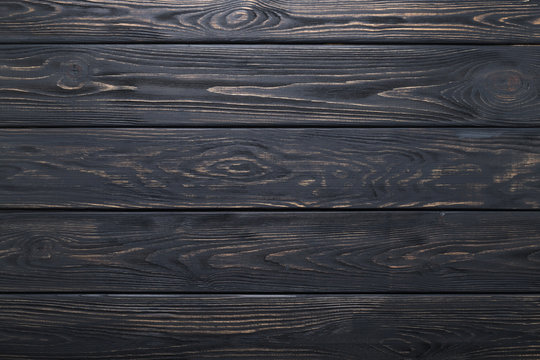 Fototapeta Black background of wooden old rustic table, planks texture, wood wall.