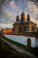 City landscape with the monastery of the holy spirit of the Orthodox church of Latvia in Jekabpils, Latvia at sunset.