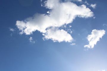 puffy white cloud and sunlight