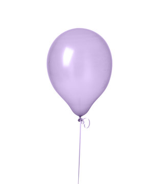 Big purple pastel color latex balloon for birthday party isolated on a white 