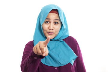 Muslim Woman Showing Smiling and Pointing Forward
