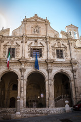 Exterior of Chiesa San Michele at Cagliari, Sardinia, Italy on a sunny day with blue sky. Located in downtown Cagliari, nobody in the scene.