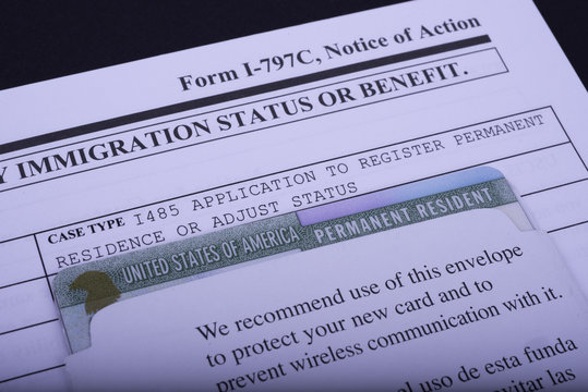 Form I-797 C, Notice of Action, Case type I 485 Application to register Permanent residence or adjust status next to Green card in envelope.