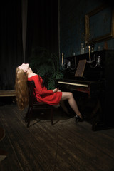 Unconcsious beauty woman at the piano