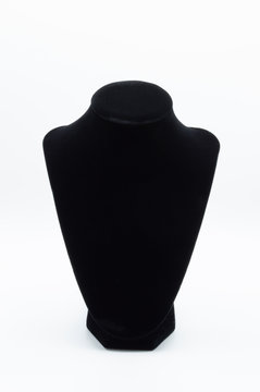 Empty black jewelry stand isolated on white background.