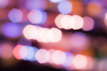 Abstract background city lights at night. Street light night market blur color bokeh background.