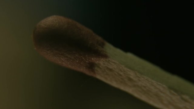 A macro shot of match head.
Slow motion.