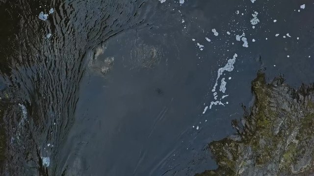 Aerial footage of a Karelian waterfall Kivach, full water flow over the top, beautiful nature, foam on water
