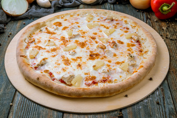 pizza Hawaiian with pineapple and chicken