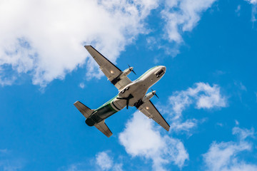 Airplane flying on blue sky