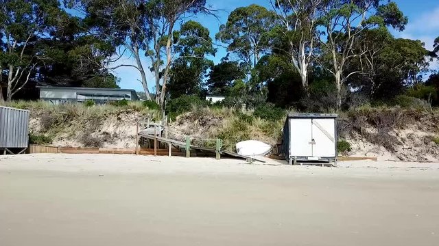 Drone shot of Boat sheds off a beach located on Bruney Island, Tasmania.