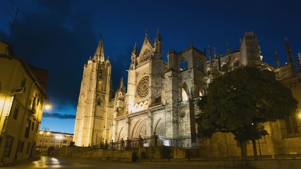 Night to day time lapse. Side view of gothic cathedral in Leon, Spain