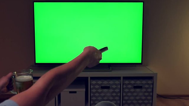 Unhappy and disappointed man watches football