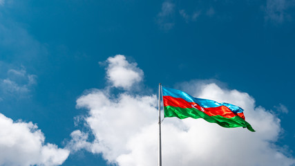 Flag of Azerbaijan against the blue sky