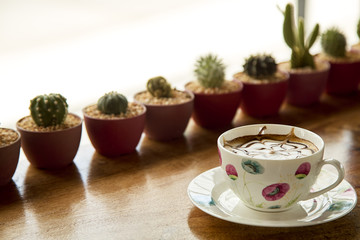 Cup of cappuccino on table