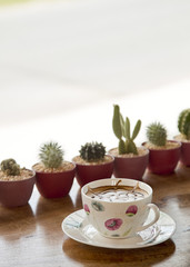 Cup of cappuccino on table