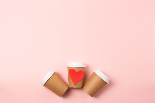 Three craft cups of coffee to go.