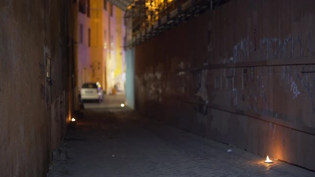 Graffiti wall in a narrow street alley in old European setting