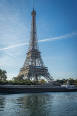 Fototapeta na wymiar Paris, France - 10 13 2018: The Eiffel Tower from the quays of Seine, at sunrise
