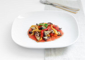 Salad of tomatoes, peppers and roasted aubergine