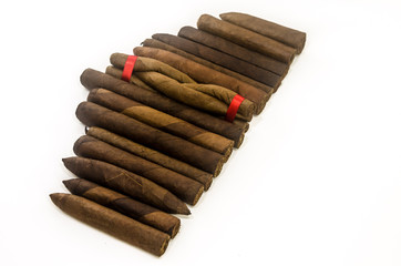 Collection of traditional handmade cigars of tobacco leafs