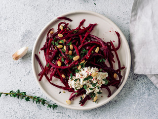 Raw beetroot spaghetti salad with soft cheese,nuts,thyme.Vegetable noodles - Fresh Beetroot Noodles...