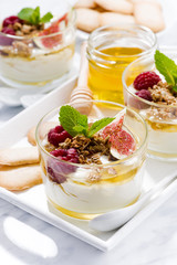 greek yogurt with honey and fresh figs, vertical