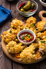 Chicken wings in breading. Deep fried chicken wing. American food