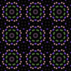 Seamless abstract pattern background with a variety of colored circles.