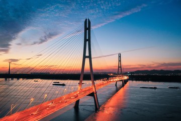 Obraz premium Sunset at The Third Nanjing Yangtze River Bridge Seen From A Drone