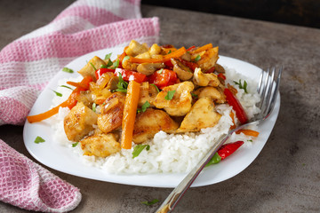 Rice with fried chicken meat and other vegetables