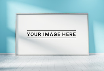 Large horizontal frame leaning on a blue wall 3D rendering