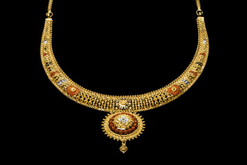Golden necklace on a black background