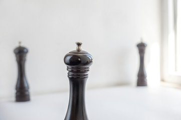 Pepper mills isolated on white background