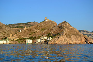 seascape on the background of mountains and architectural structures