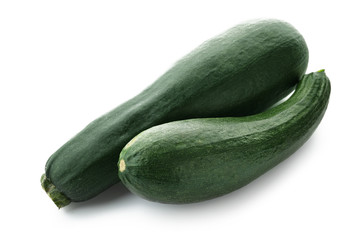 Fresh zucchinis on white background