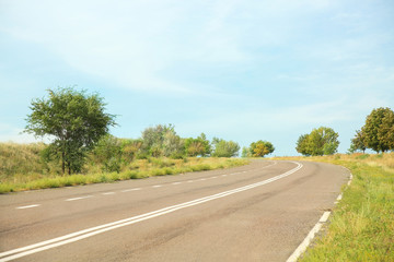 Empty asphalt road in countryside