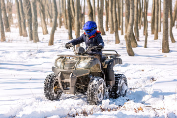 Travel in the winter on the ATV. Beautiful winter nature. © Ахтем