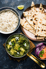Palak Paneer Curry made up of spinach and cottage cheese served in a bowl or pan with roti or rice