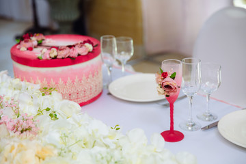 Beautiful decorated wedding restaurant for marriage. Colorful decoration for celebration. Beauty bridal interior. Concept of style of banquet hall